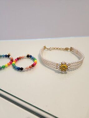 Venessa Arizaga Smiley Face Pearl Choker and Rainbow Beaded Earrings